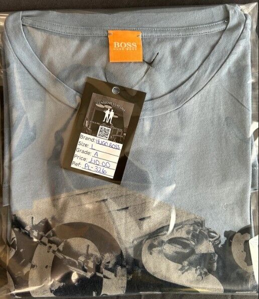 Folded Hugo Boss blue graphic t-shirt in packaging with branded label and price tag
