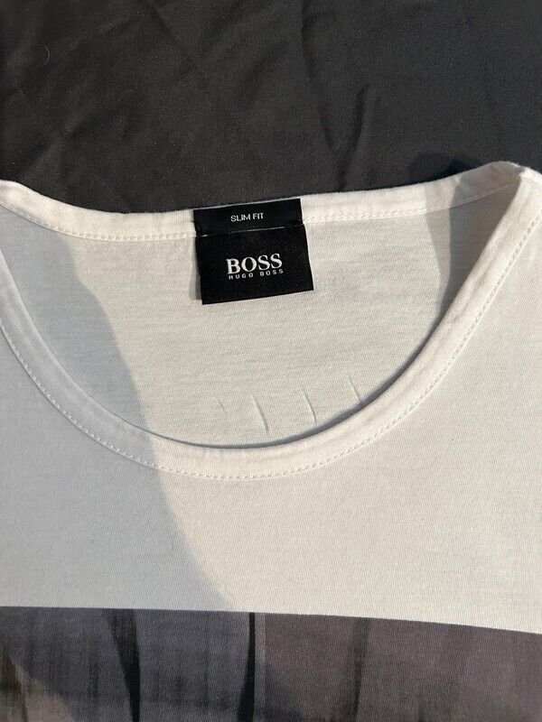 White Hugo Boss slim fit men's designer t-shirt with black neck label close-up