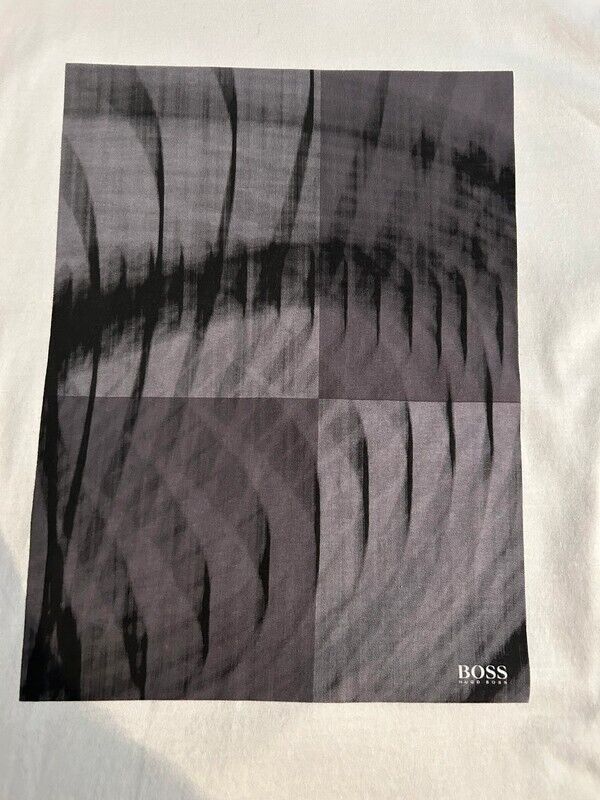 Monochrome abstract graphic print on white fabric with BOSS logo in corner