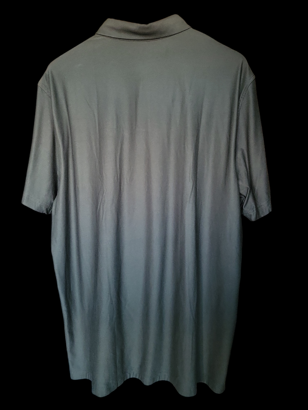 Back view of a grey short-sleeve men's polo shirt on black background
