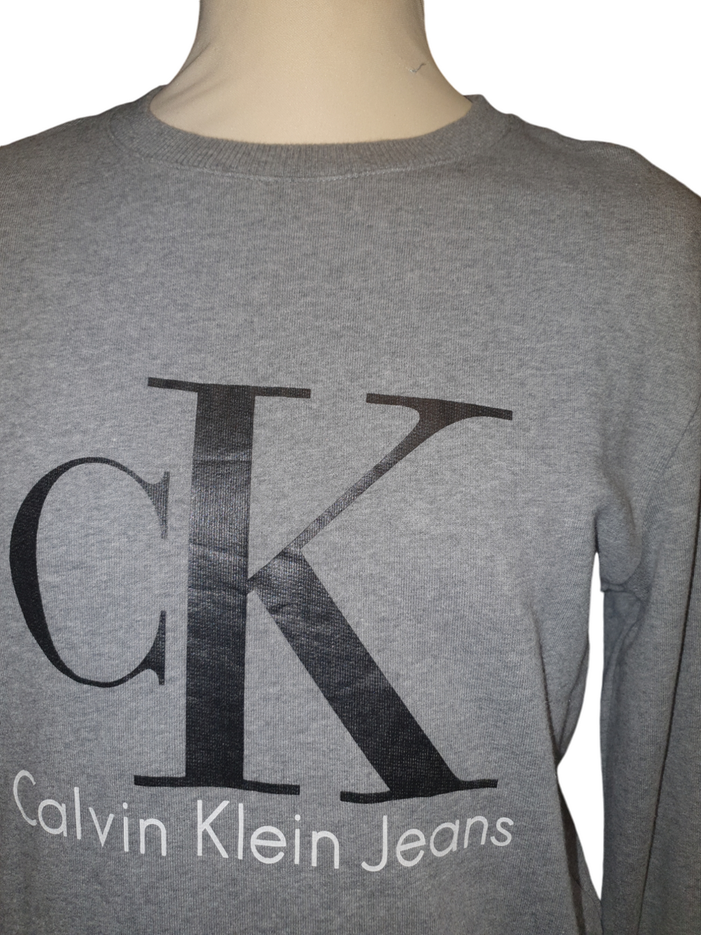 Grey Calvin Klein Jeans logo sweatshirt for men on mannequin, luxury designer clothing